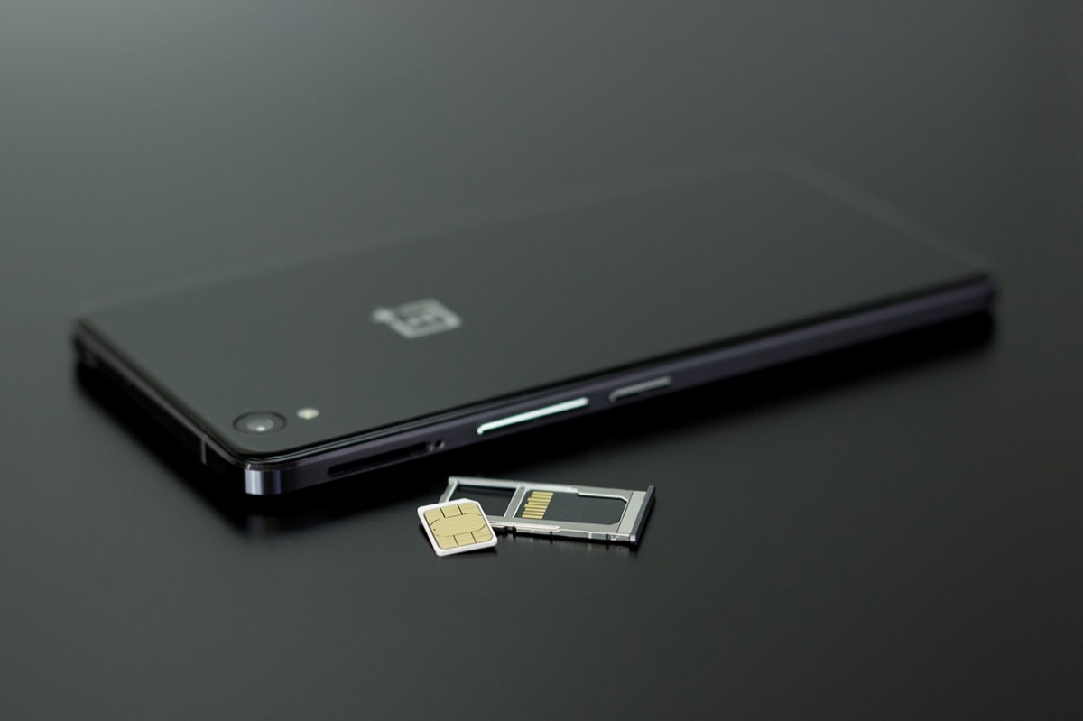 Sim card with digital display in office setting